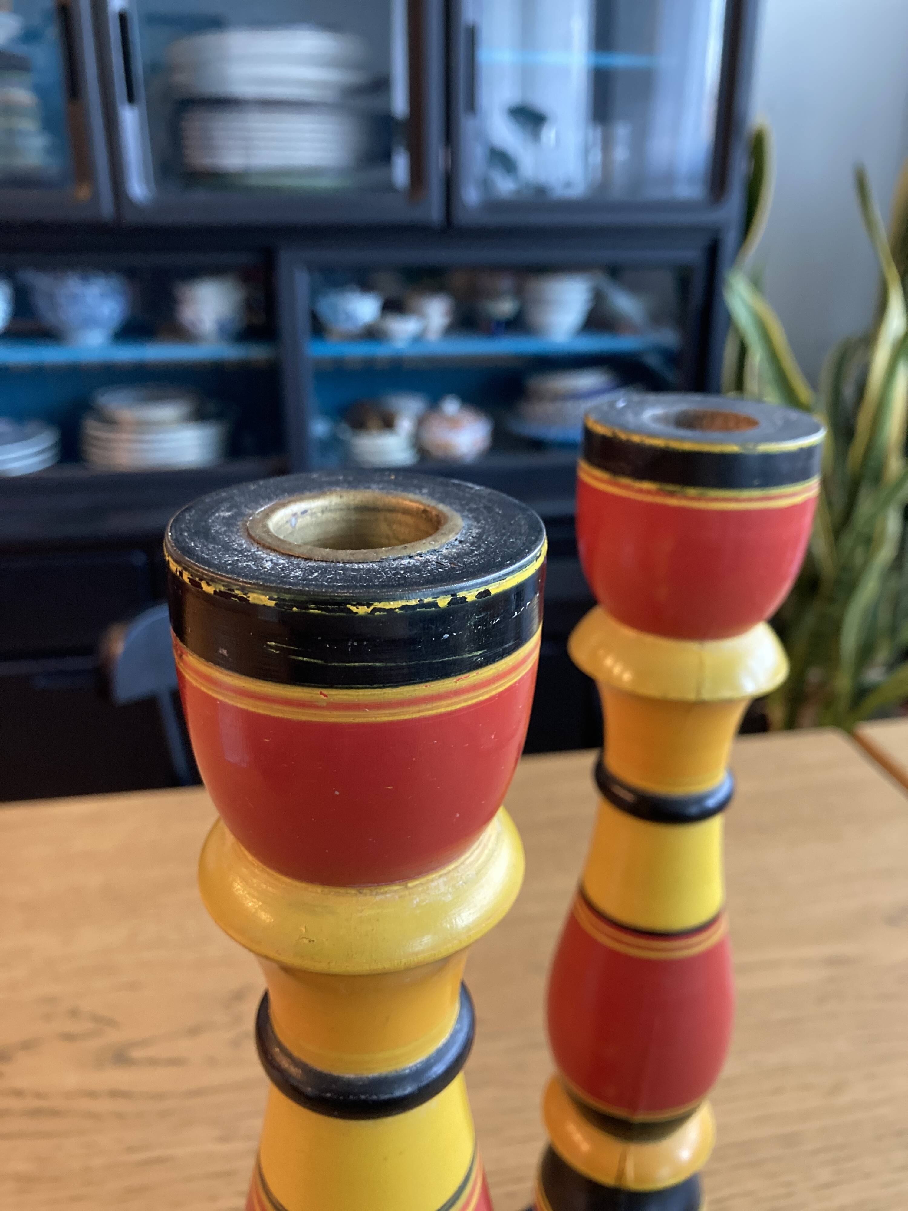 Polychrome turned wooden candlesticks