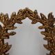 Louis XVI style gilt mirror with laurel wreath crest, Belgium, 20th century