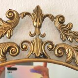 Miroir ovale en laiton style baroque vénitien 51x74cm