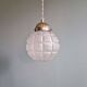 Art Deco trio of frosted glass pendants, 1920s-30s.