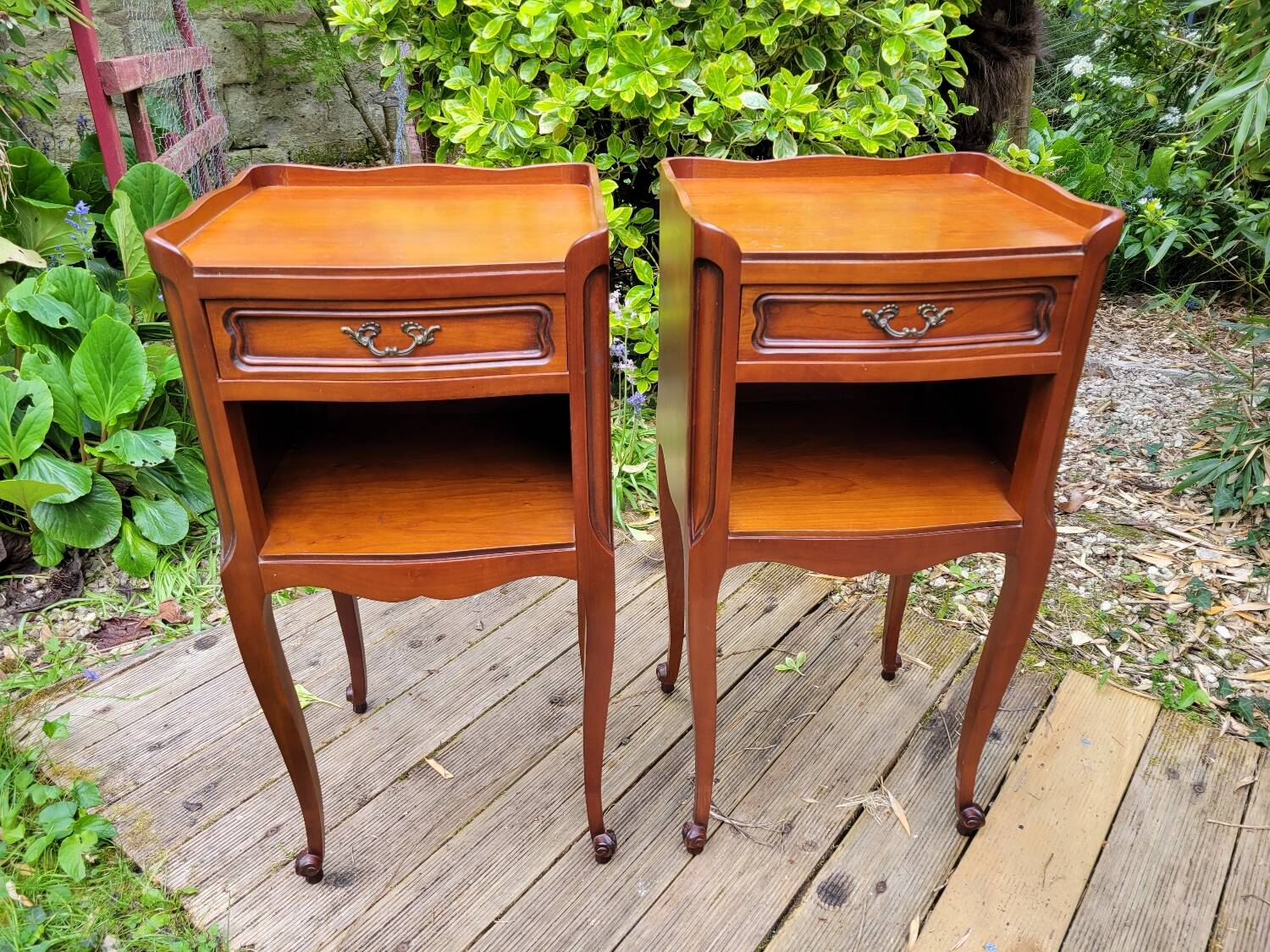 Pair of Louis XV bedside tables in cherry wood.
