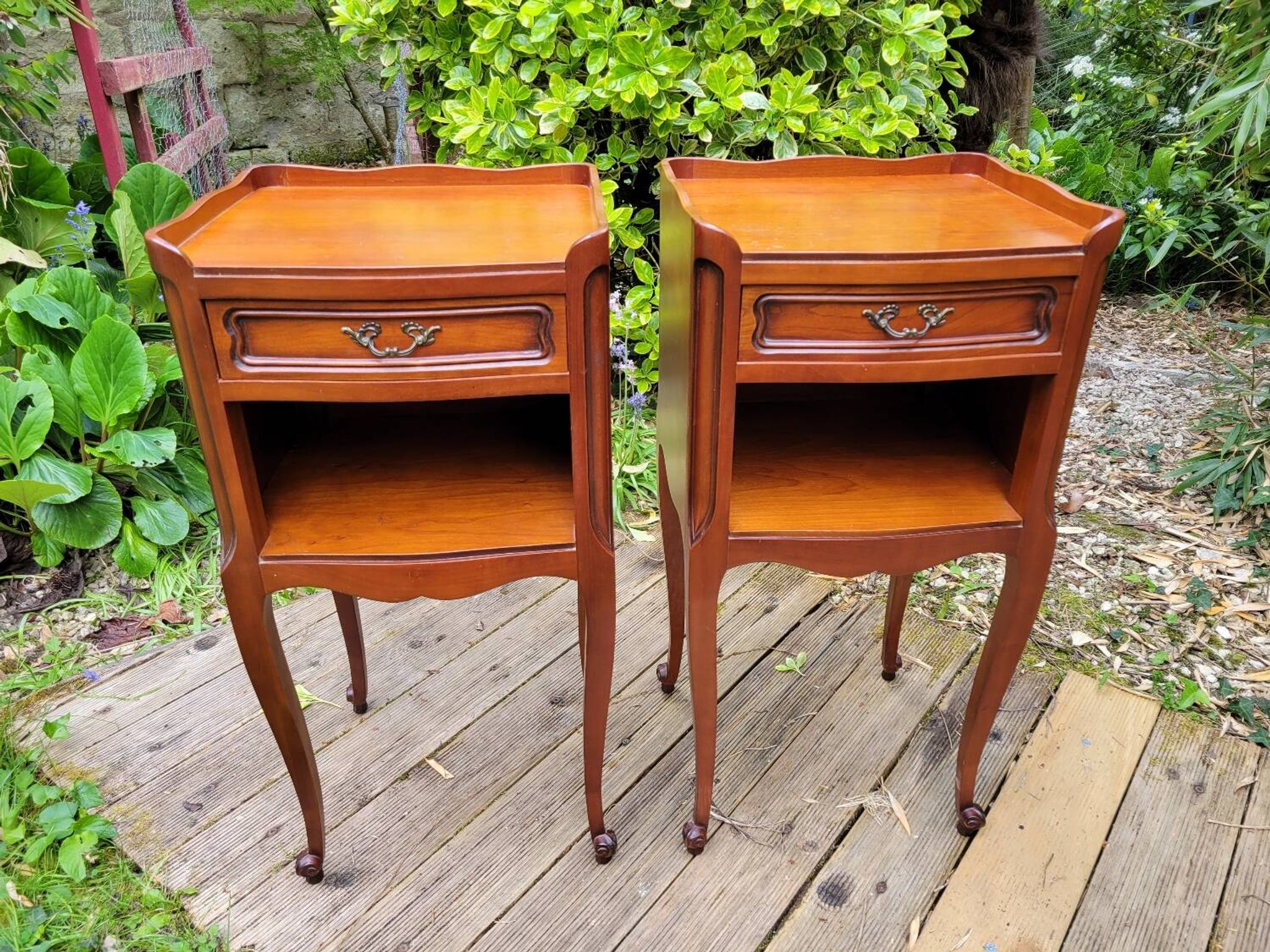 Pair of Louis XV bedside tables in cherry wood.