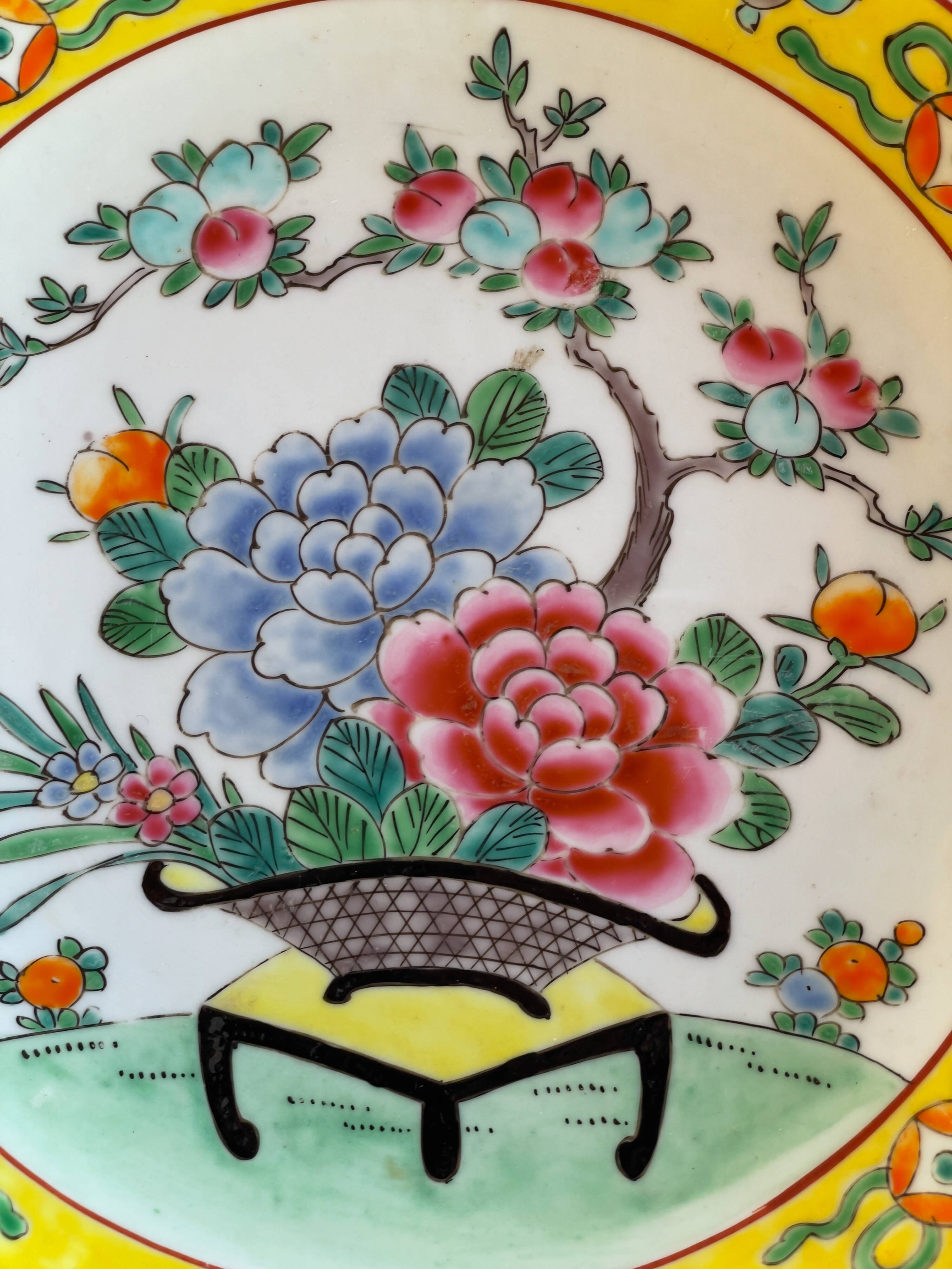 Yellow porcelain plate with saturated and vivid colors. Handmade in Japan