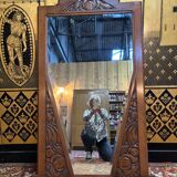 Art deco mirror in carved walnut