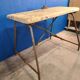Vintage workbench circa 1930, folding metal leg.
