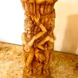 Two ancient Indonesian candlesticks.