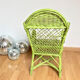 Children's chair in green rattan