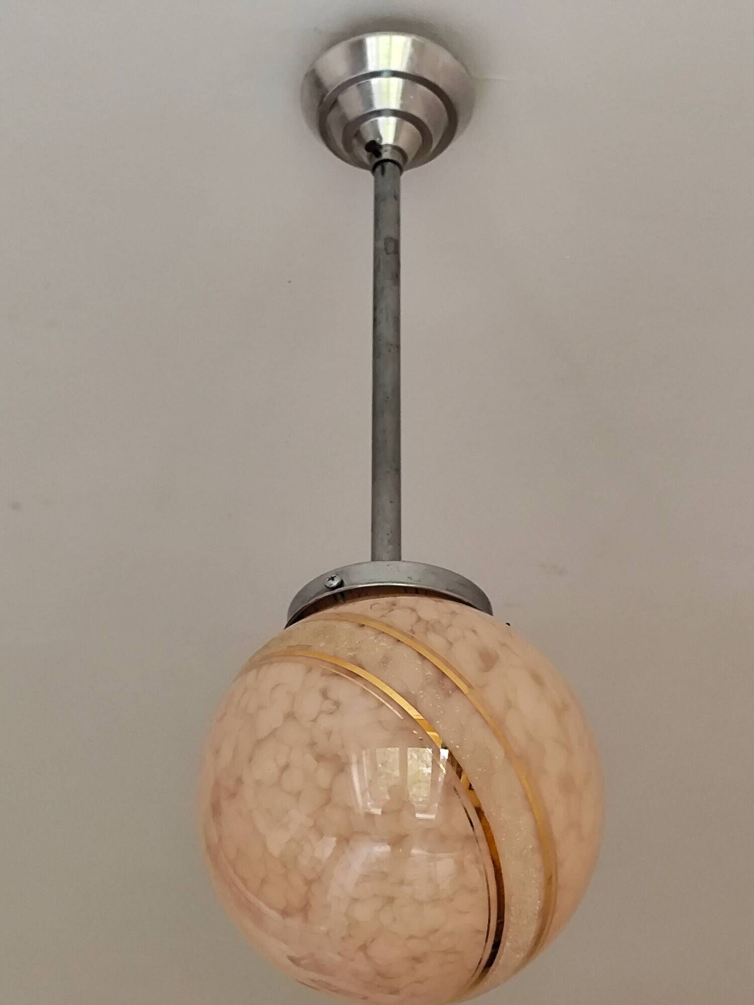 suspension glass globe pink and gold on a metal aluminium stem and structure