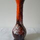 Vase en céramique orange marron avec coulures en relief
