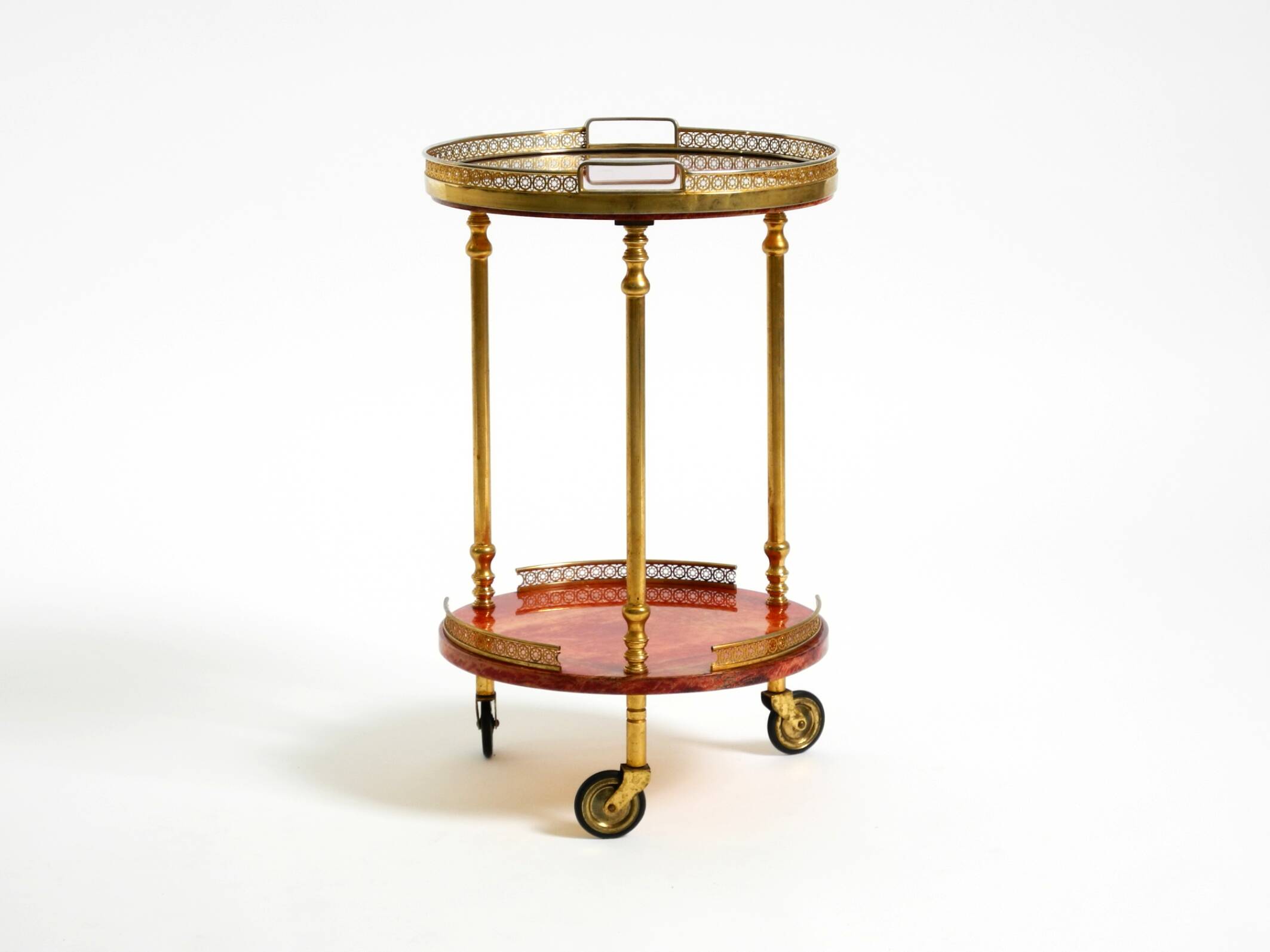 Round, small 1960s Aldo Tura serving or bar trolley in red goatskin leather