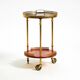 Round, small 1960s Aldo Tura serving or bar trolley in red goatskin leather
