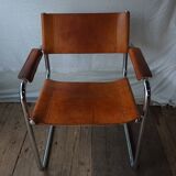 Three  leather armchairs