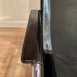 Black leather reclining lounge chair, "Hans Eichenberger" design, 1960.