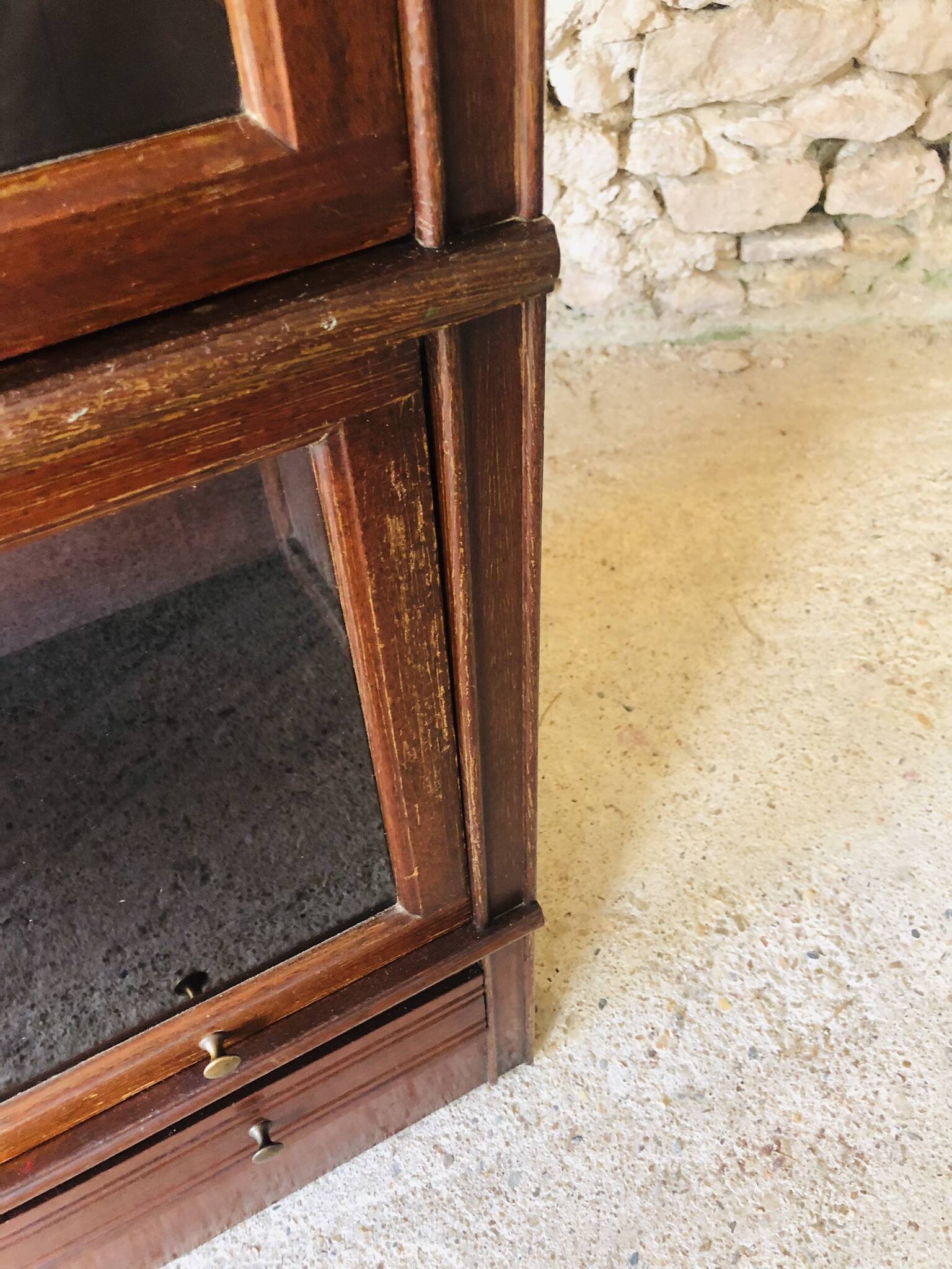 Vintage mahogany avocado bookcase with overhead glass doors circa 40's/50's