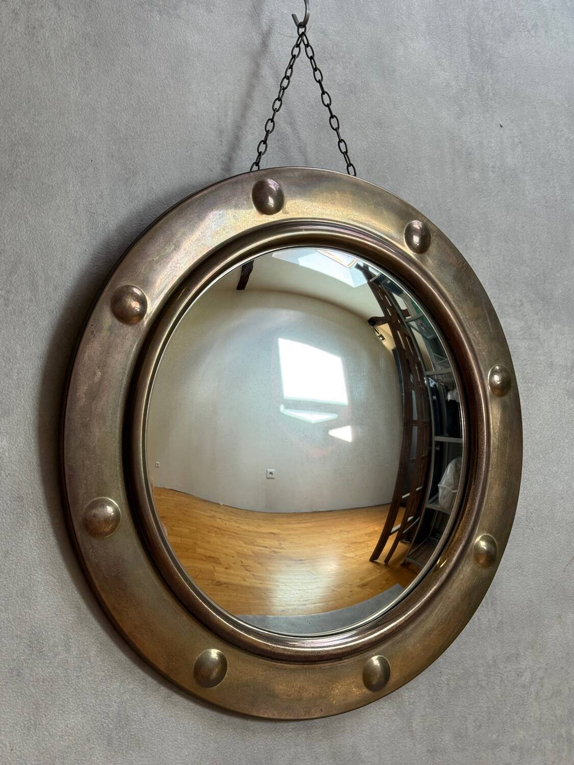 50s French porthole-style witch mirror with convex glass.