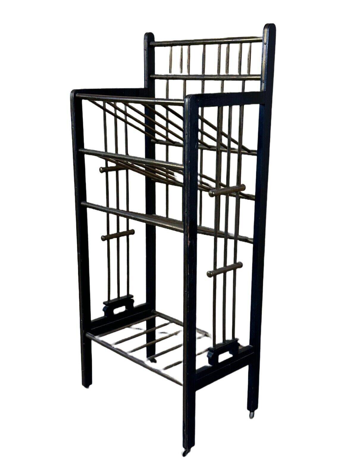 Magazine rack from Wiener Werkstätte Austria made of mahogany & brass around 1900