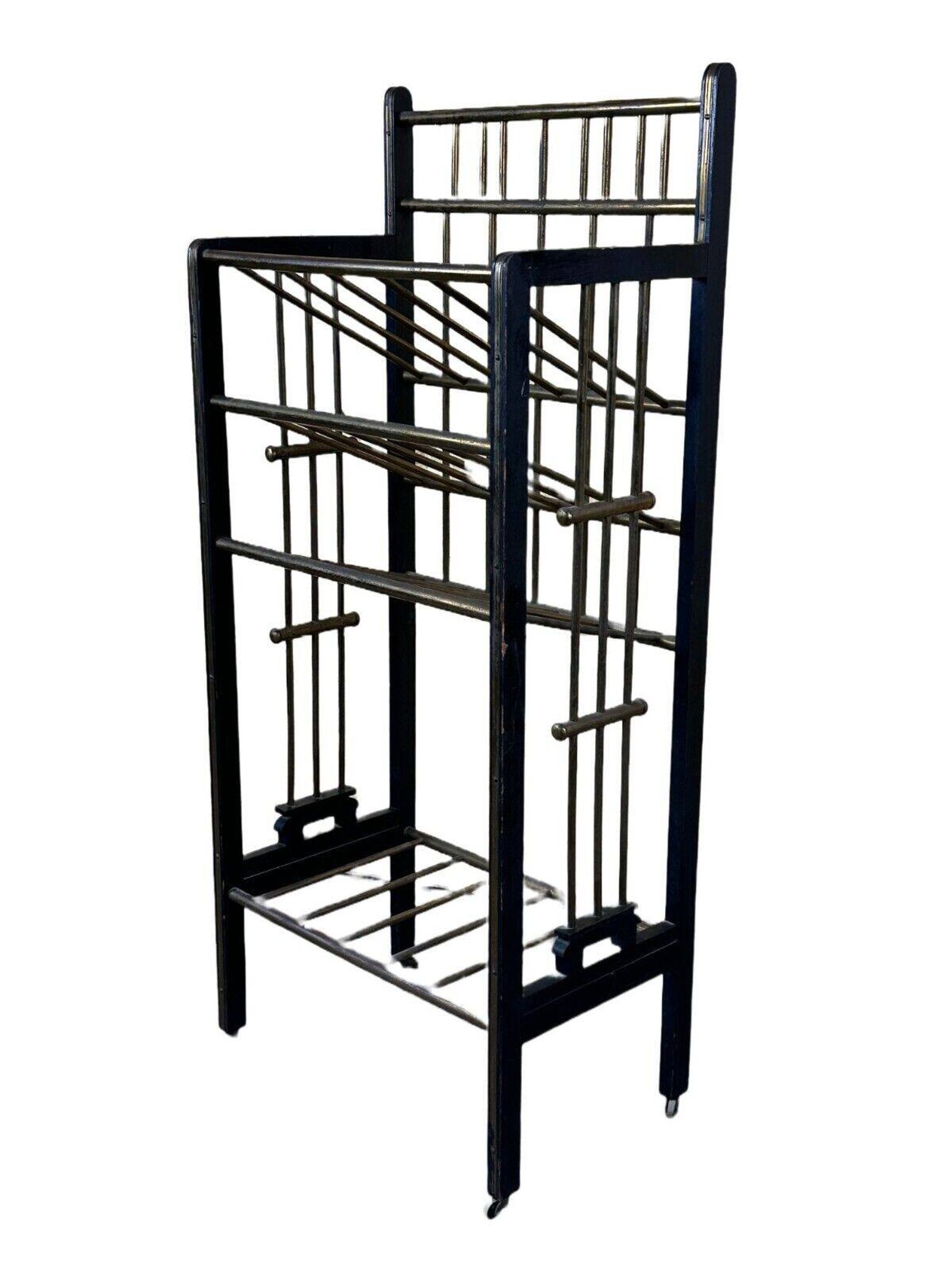 Magazine rack from Wiener Werkstätte Austria made of mahogany & brass around 1900