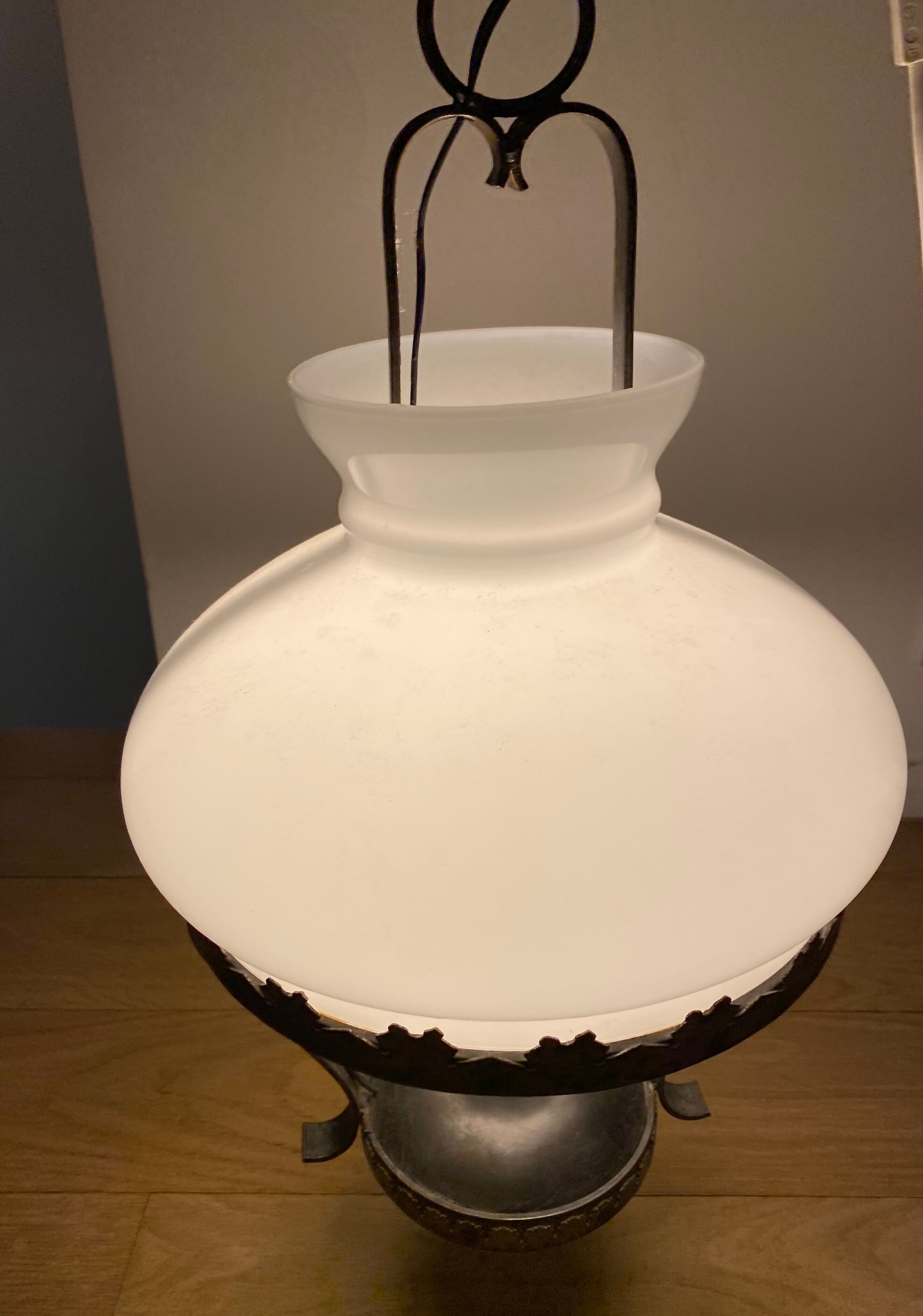 Metal chandelier and opaline glass gloss