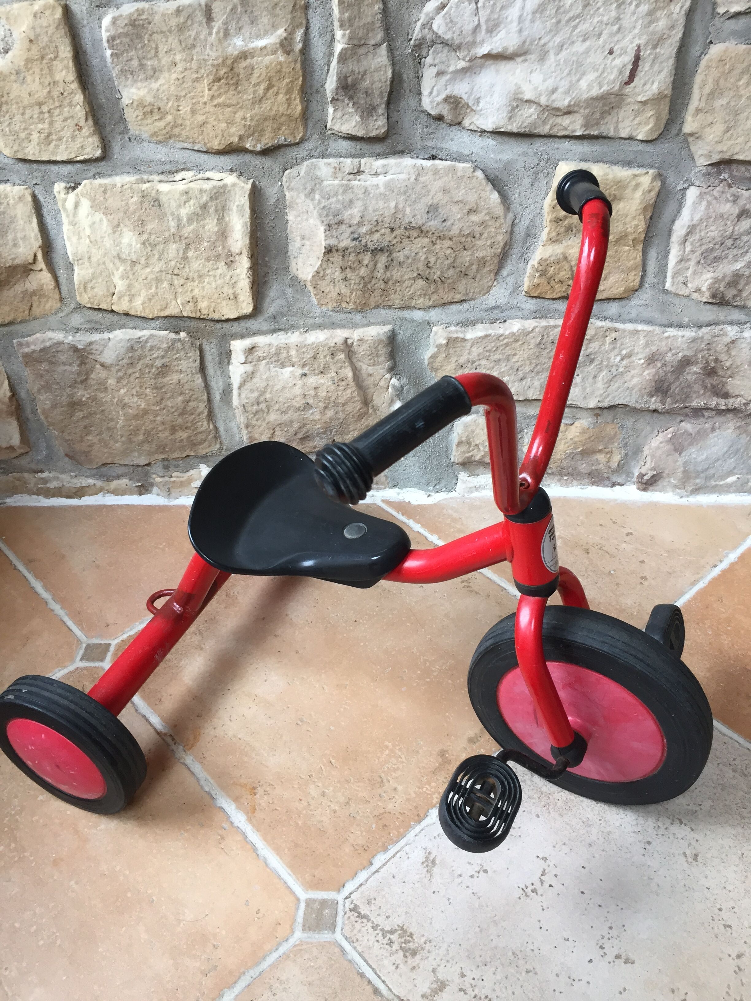 Red child tricycle