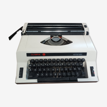 Olympia Alphamatic typewriter with Notice