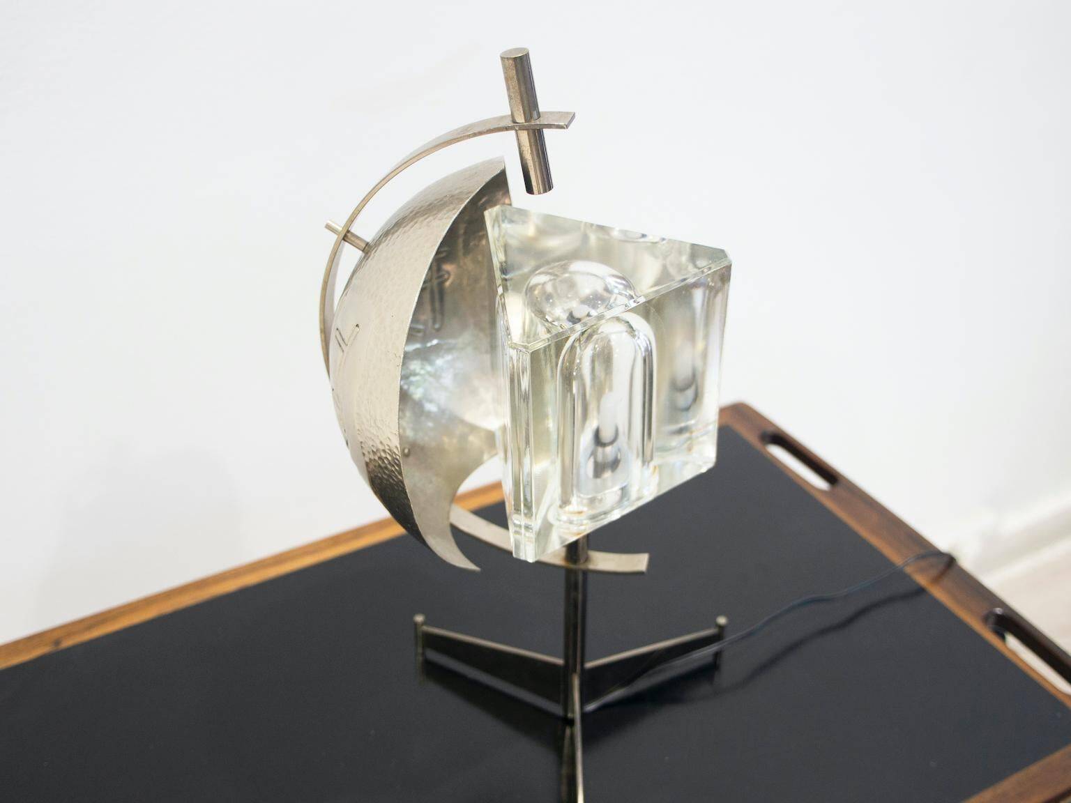 Metal table lamp with triangular glass light on tripod stand, 1970s.