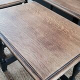 Nest tables in wood and black.