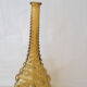 Green yellow bubble glass bottle