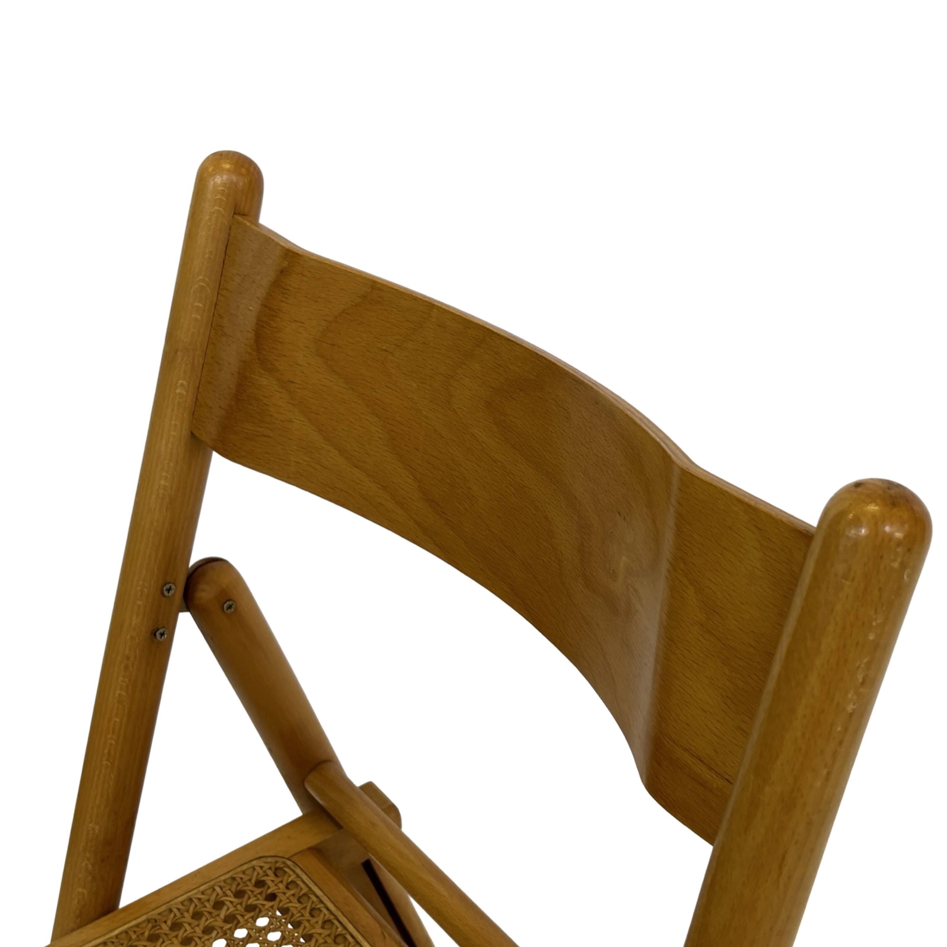 Vintage wooden folding chair with rattan seat 80s minimalist design