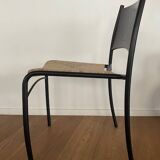 Set of 8 chairs in black lacquered metal and straw seats