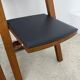 2 old folding chairs in wood and leather, postmodern design from the 80s vintage