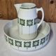 Basin and bowl Badonviller model Sofia white ceramic with green patterns.