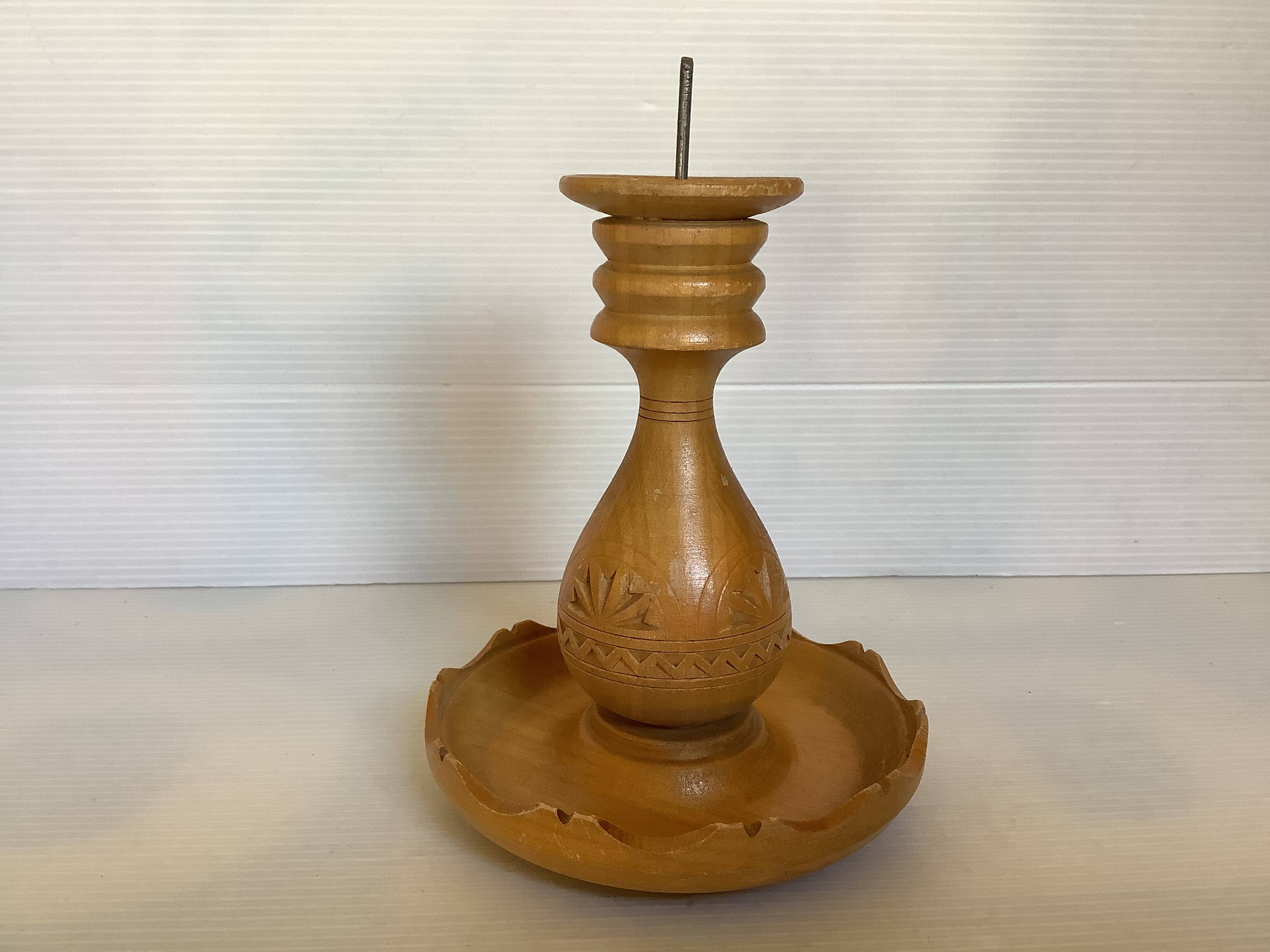 Carved wooden candle holder