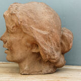 Woman's head, reconstituted stone