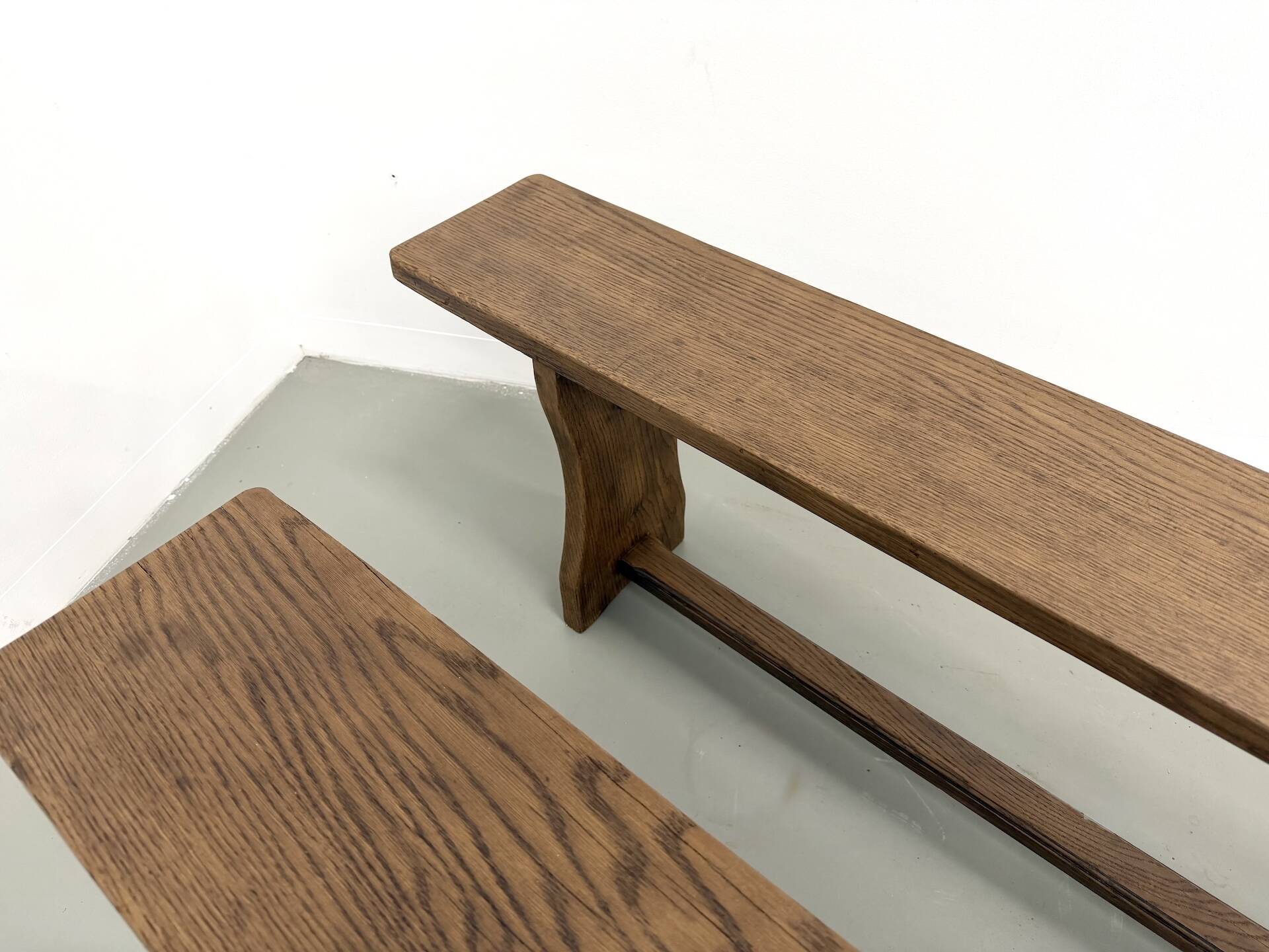 Pair of solid oak benches, winged legs, France, 1970s