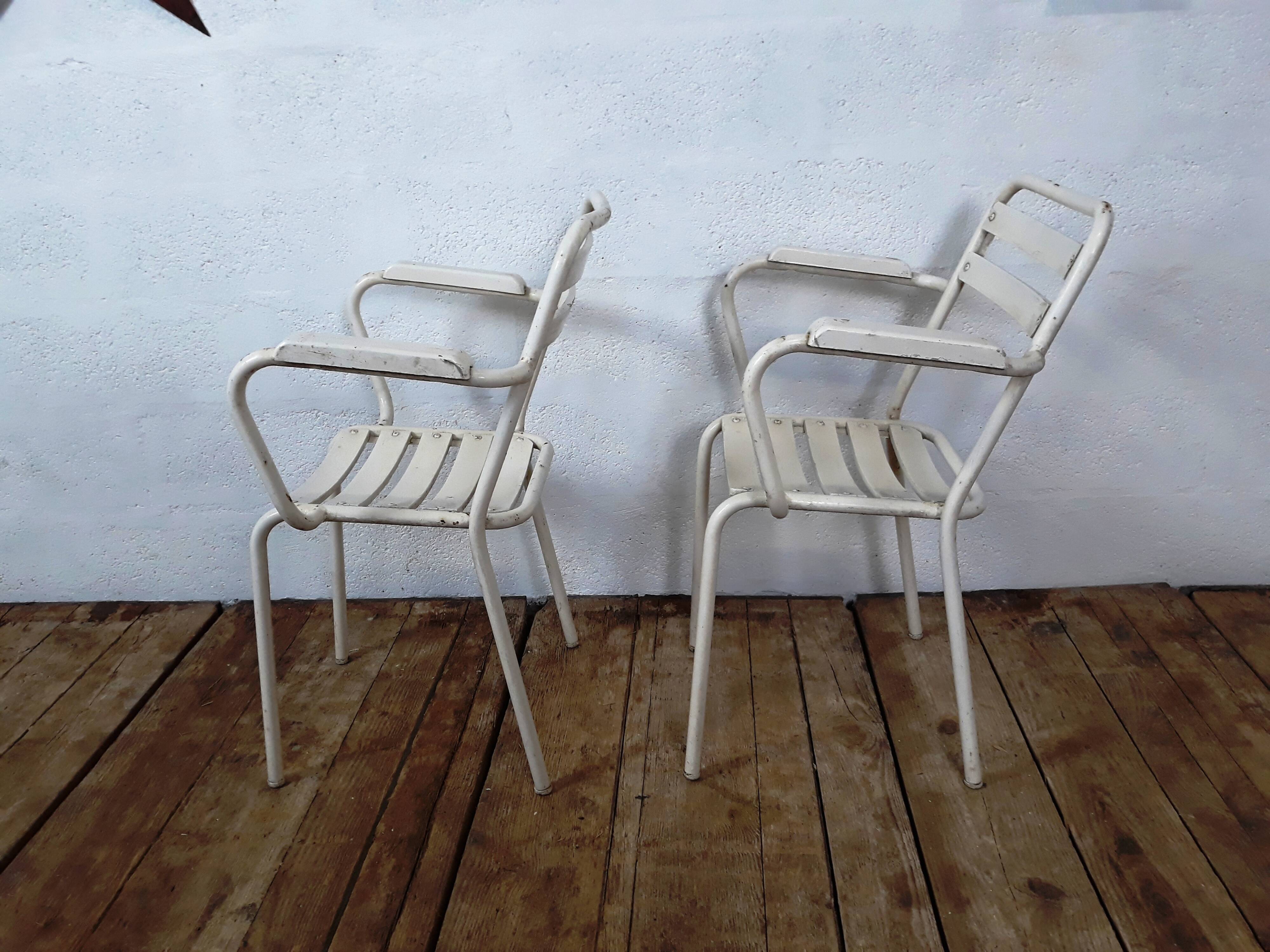 4 chairs and armchairs by Tolix