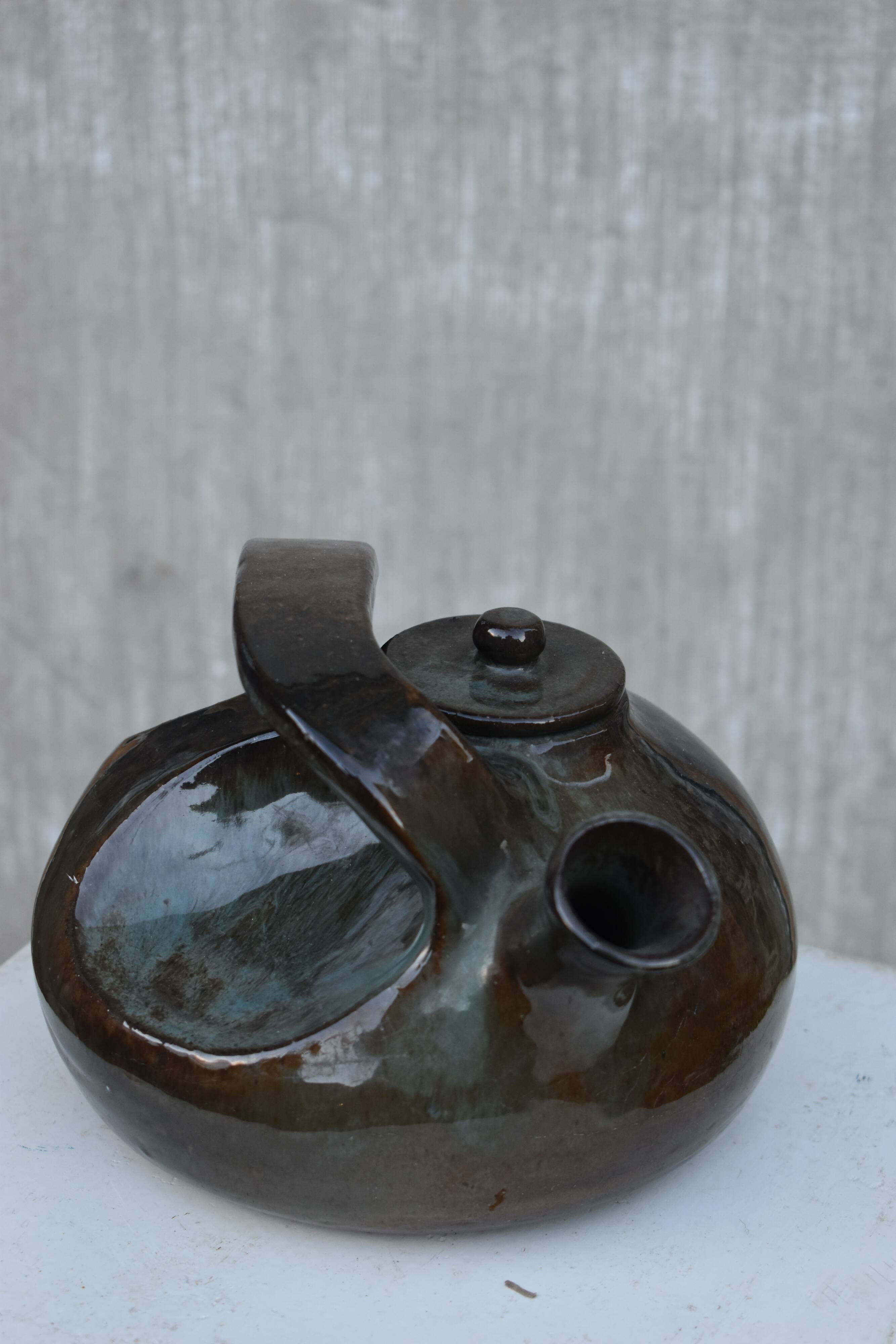 Glazed terracotta teapot