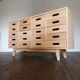 Merchandising chest of drawers by James Leonard Esavian