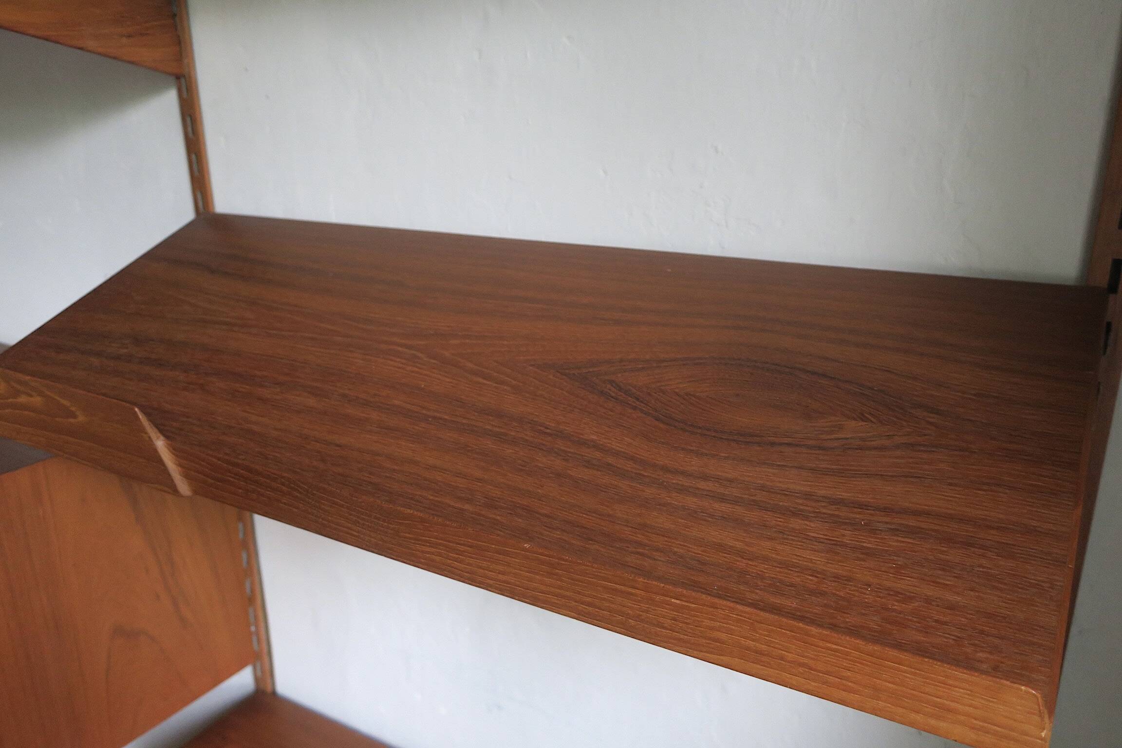 Modular 3-compartment teak wall shelving system with desk and lighting by Kai Kristiansen for FM, Denmark, 1960s