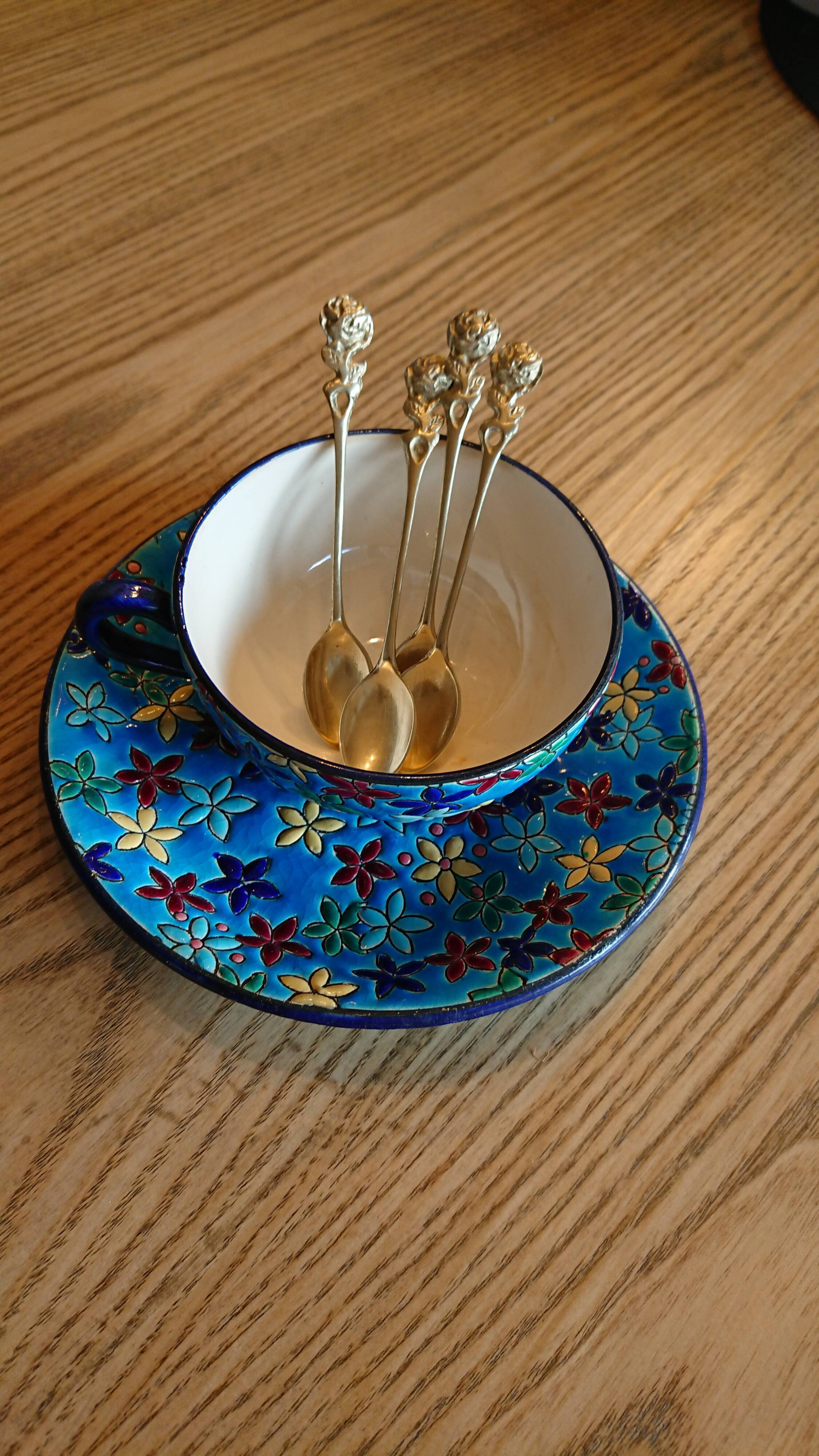 Small golden spoons with punch