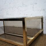 Gold chrome coffee table with double smoked glass tops 1970s