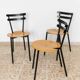 Set of 3 mid-century Italian stackable chairs in black steel and wood, made in Italy, 1970s.