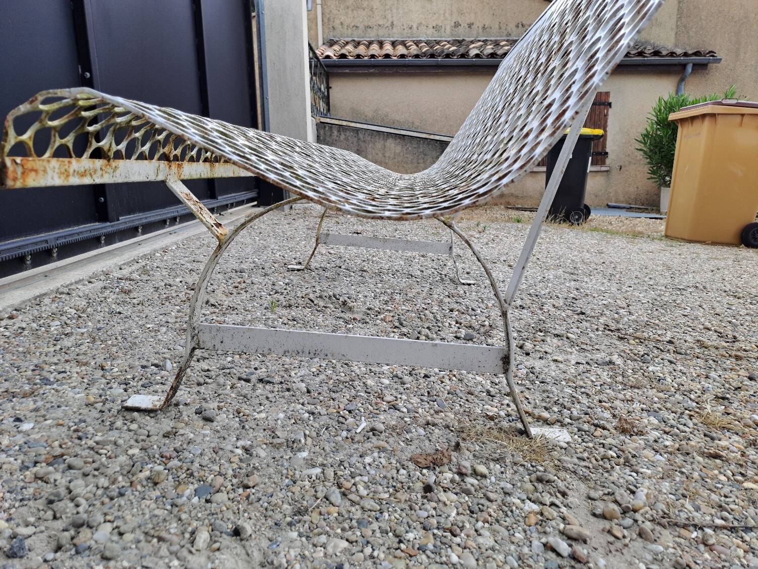 Garden bench in iron and perforated sheet metal