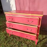 Matte gold and red patinated chest of drawers