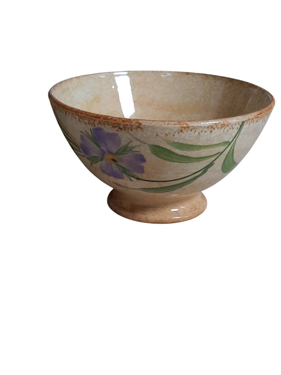 Old bowl in earthenware with floral decoration.