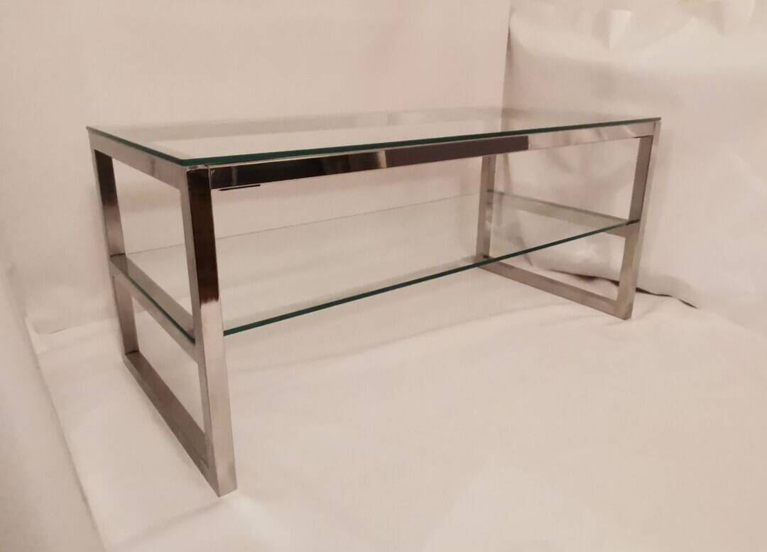 1980s coffee table with a double chrome metal top.