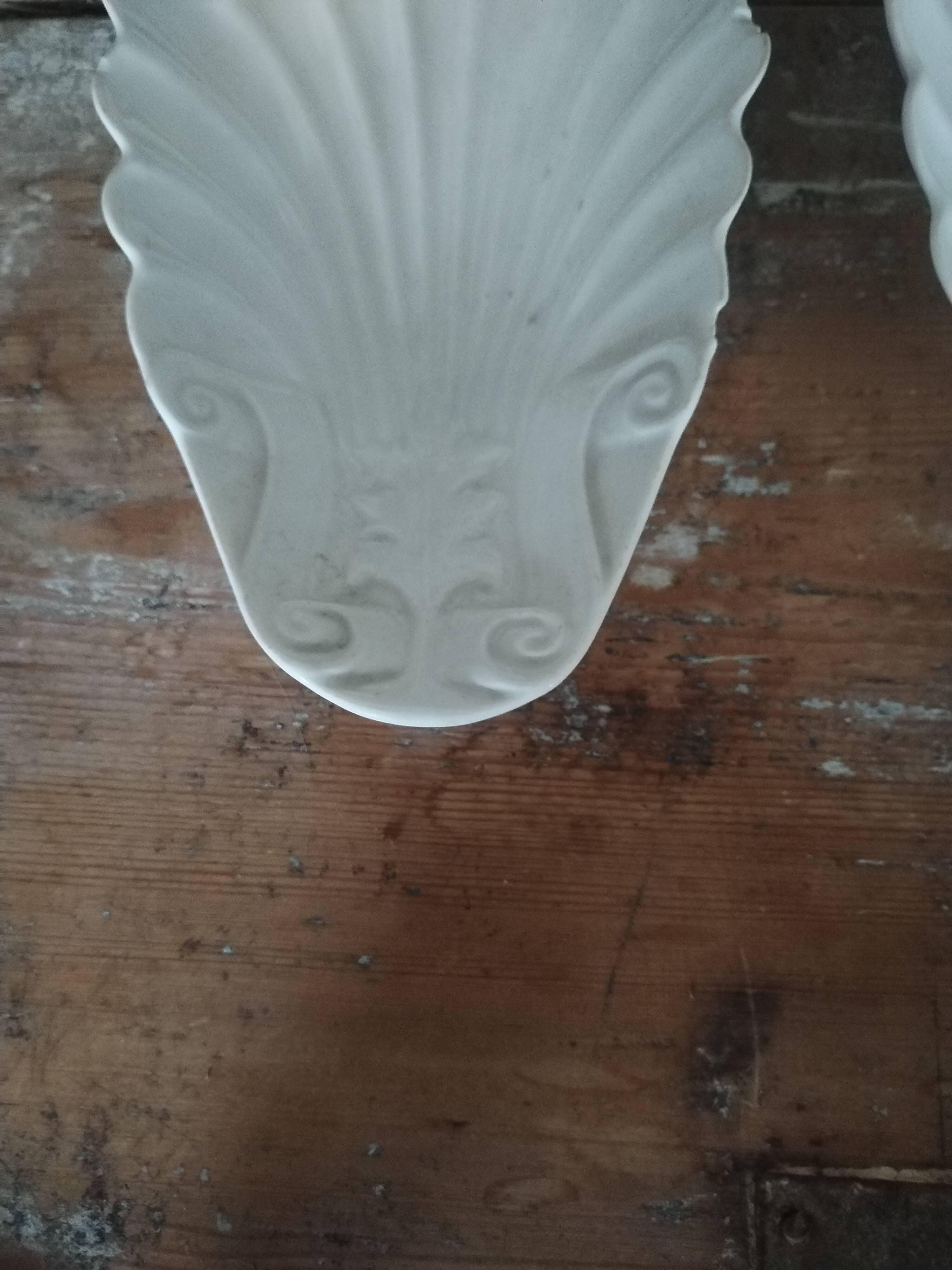 Pair of white earthenware shells 19th