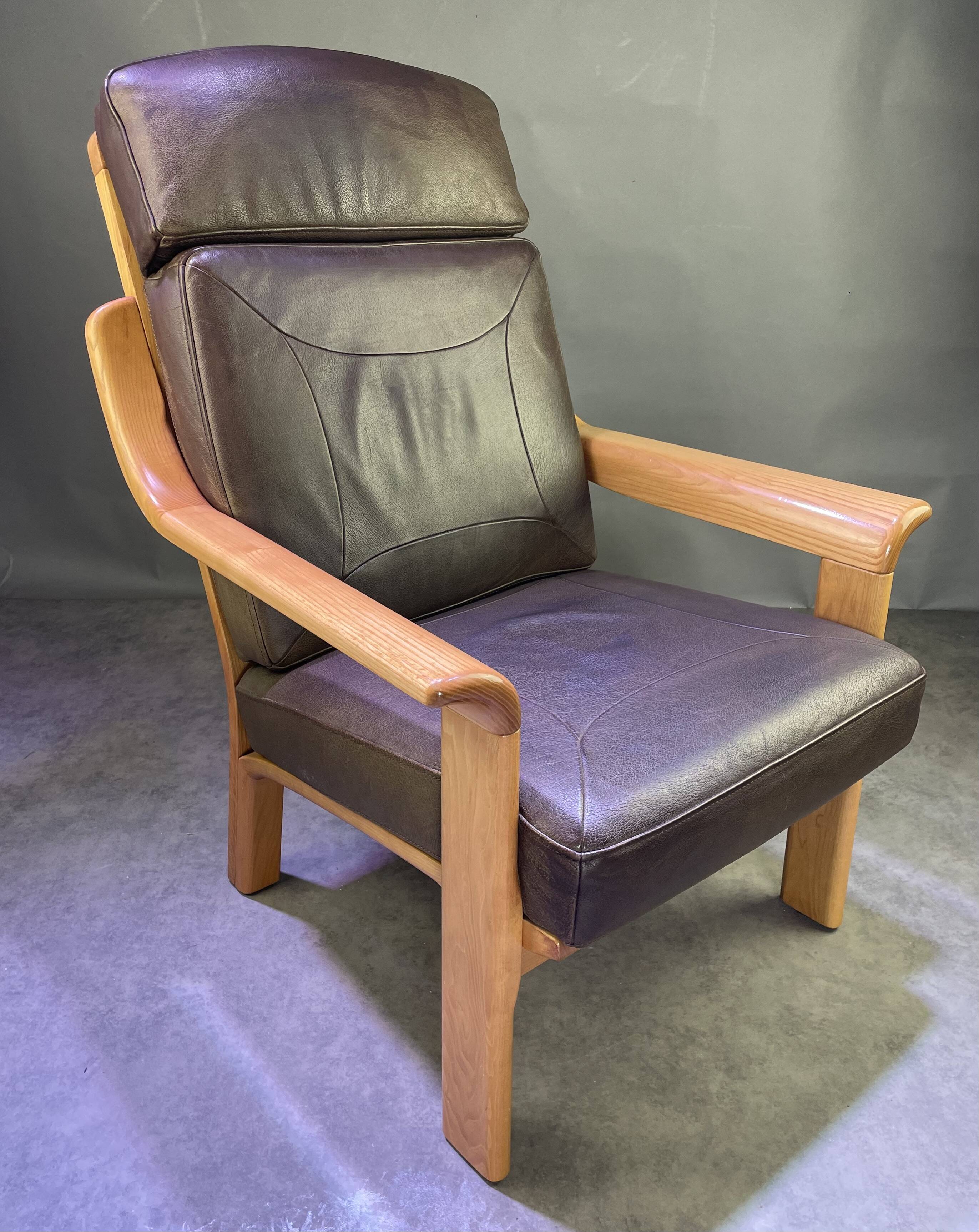 Chocolate leather armchair, wooden structure