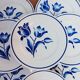 Lot de 8 assiettes plates Badonviller, Brétigny, fleurs bleues