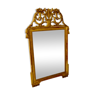 Mirror in fronton in golden wood