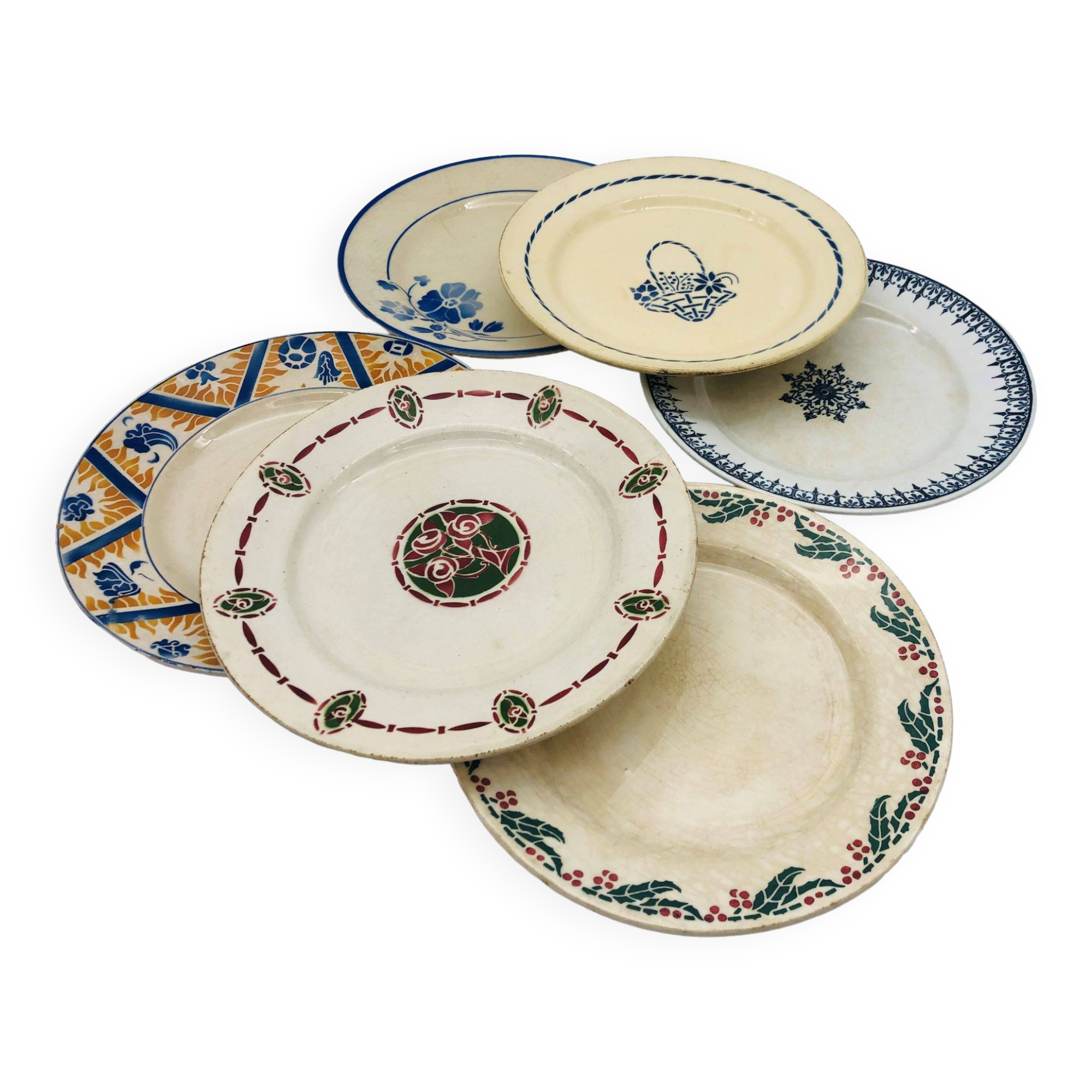 Series of 6 mismatched dinner plates.